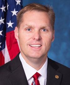 Official portrait of Rep. Michael Patrick Guest